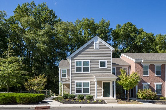 a house with a street in front of it