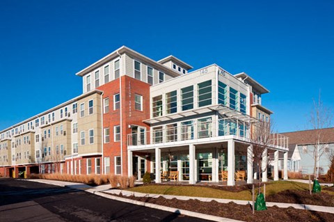 a large building with a street in front of it