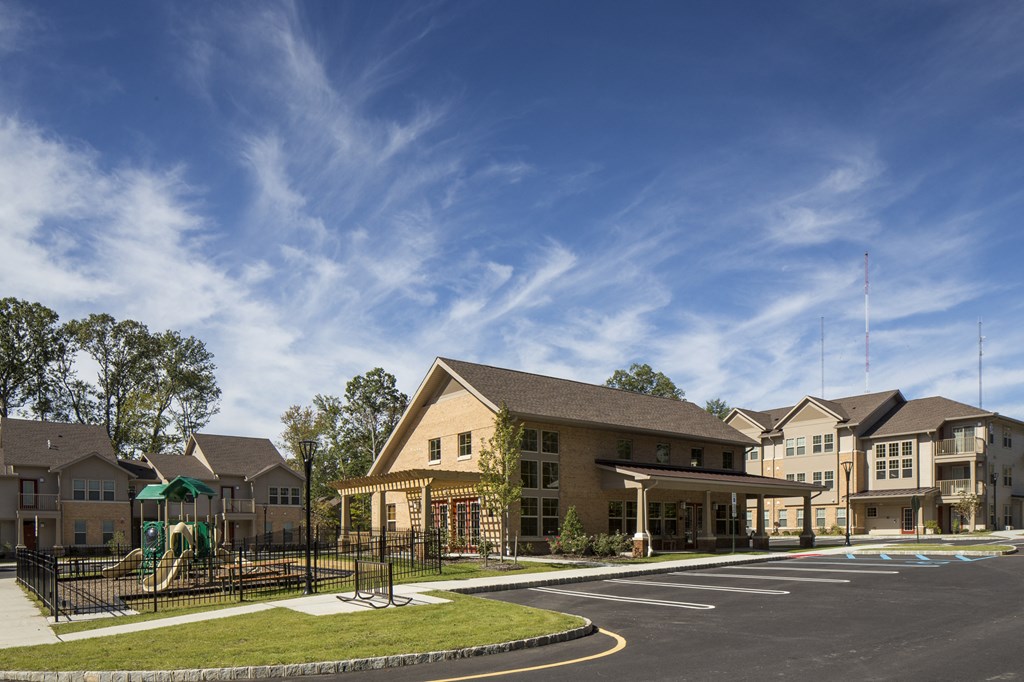 a building with a playground in front of it