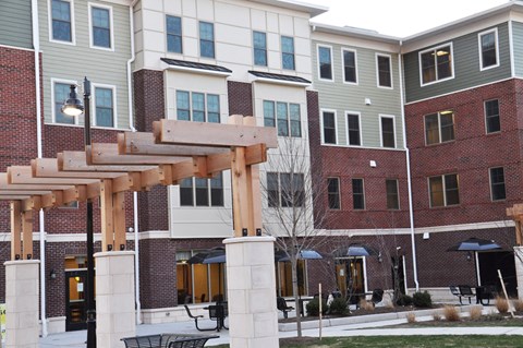 a building with a wooden structure in front of it