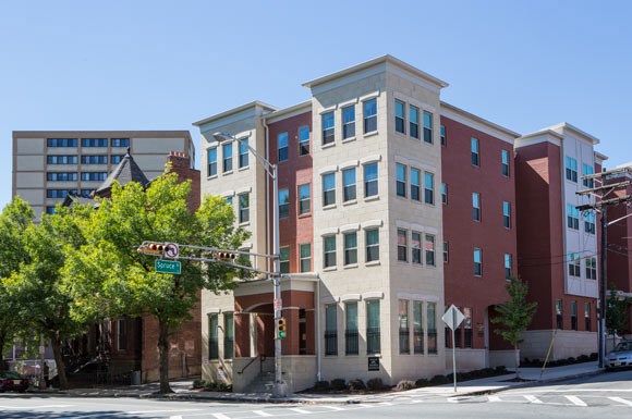 a building on the corner of a street