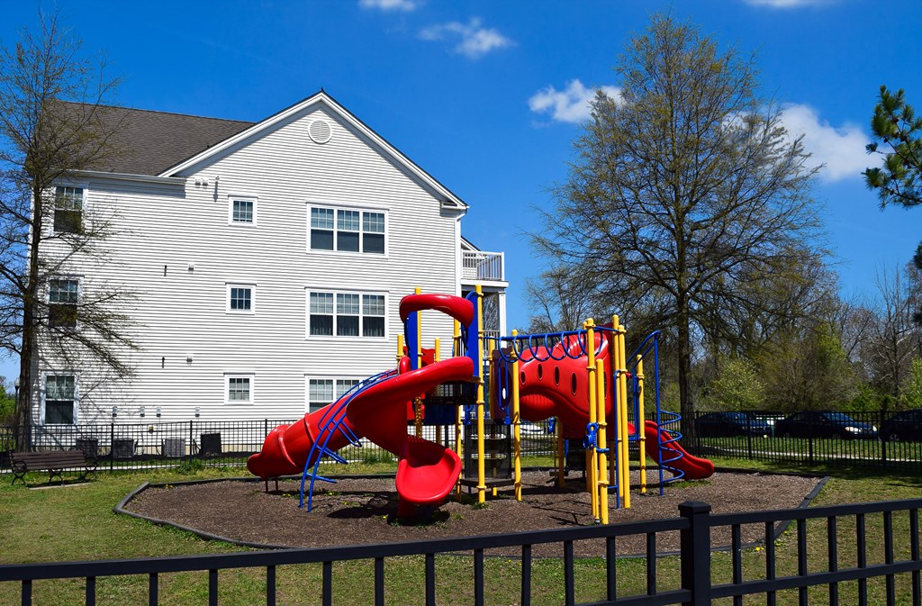 a playground in front of a house