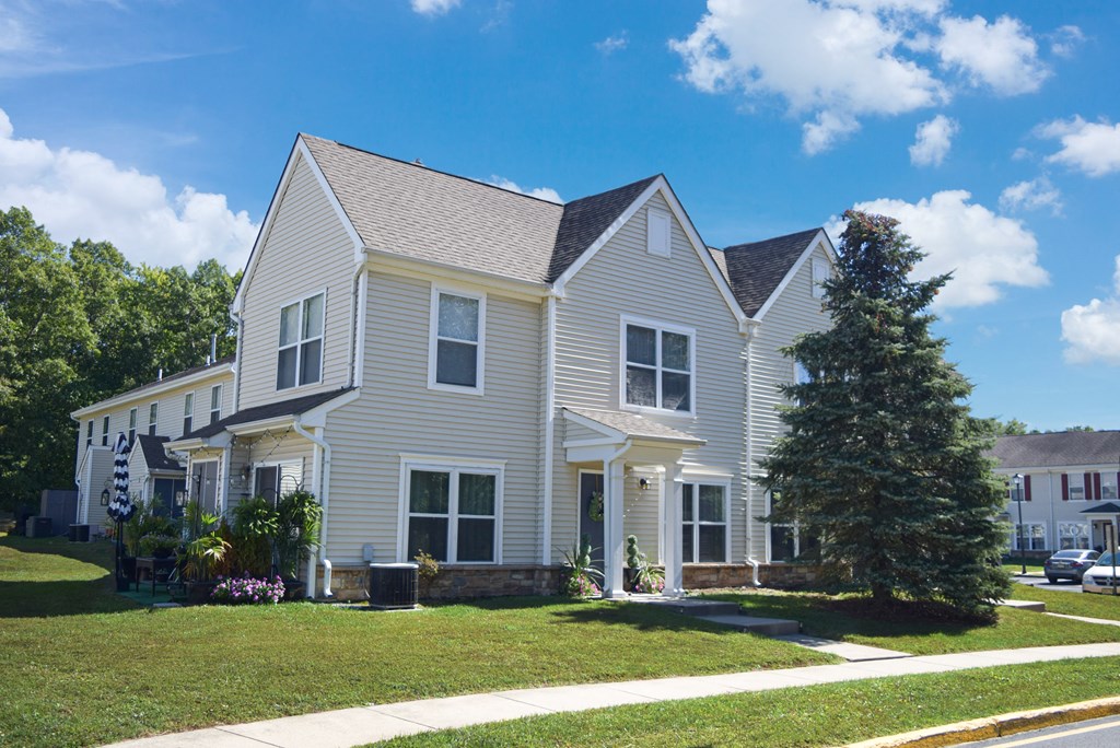 a house on the side of a street