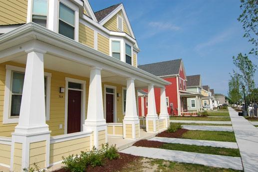 a row of colorful houses on a street
