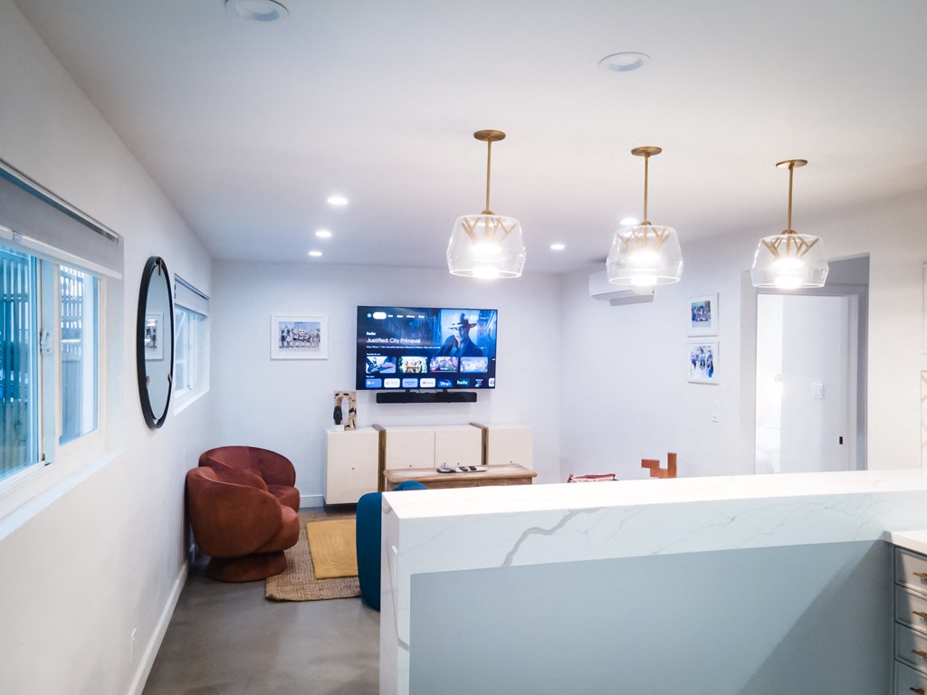 a view of a living room from the kitchen of a house
