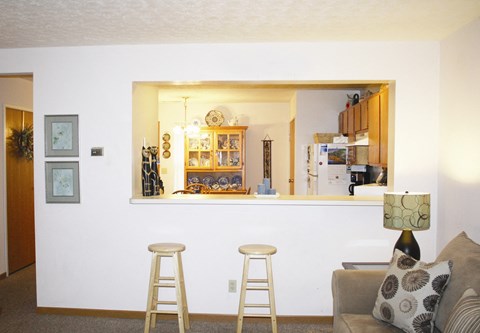 a view into the kitchen from the living room