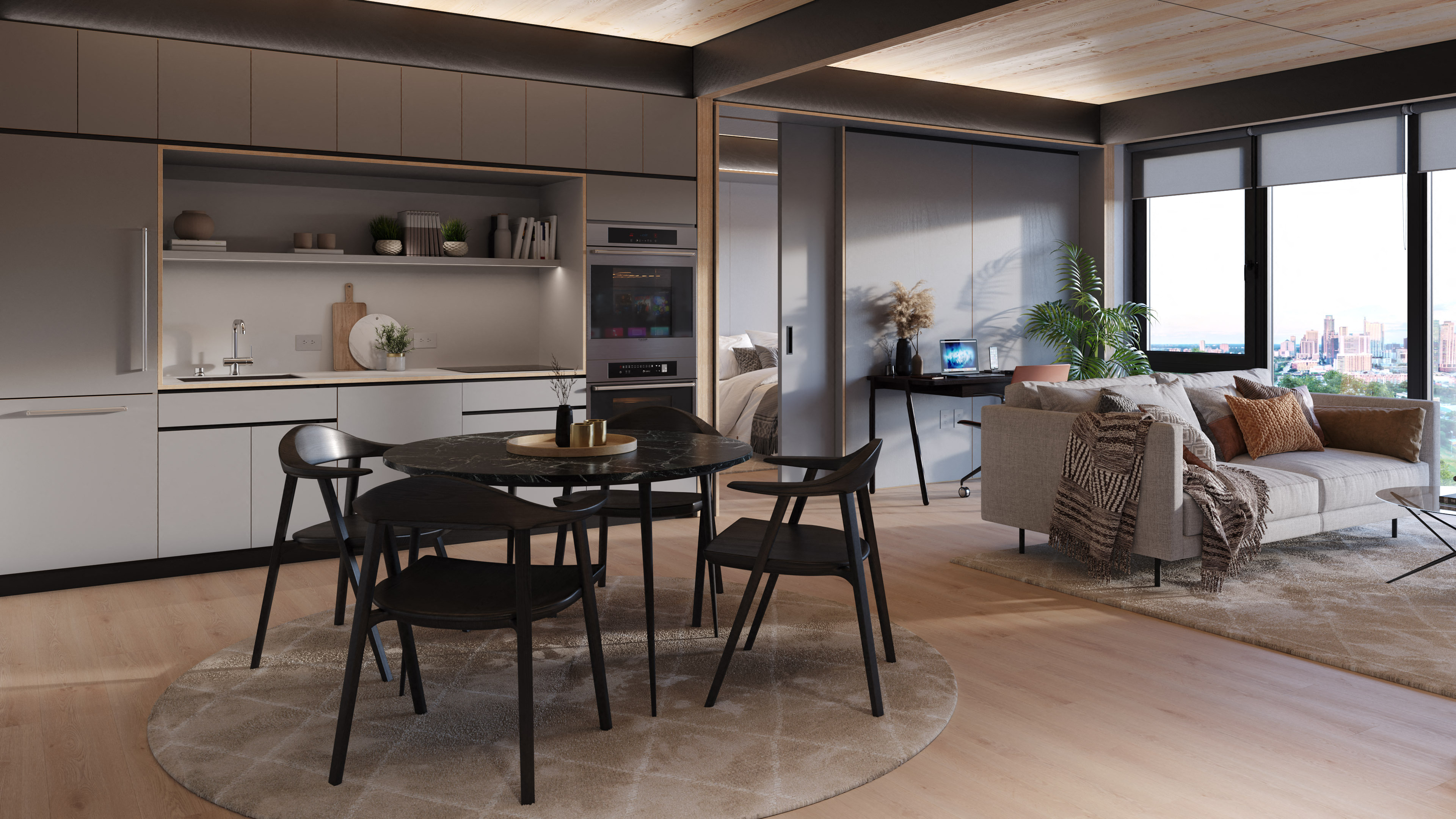 A modern kitchen with a dining table set for four.