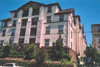 a large building with a car parked in front of it