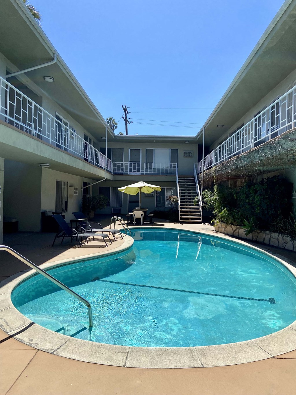 the pool is in front of the building