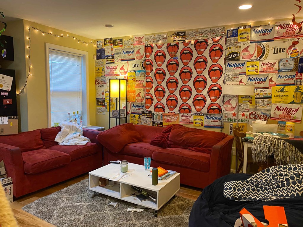 a living room with two couches and a coffee table