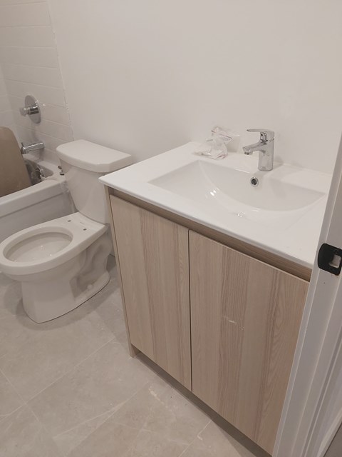 a small bathroom with a sink and a toilet