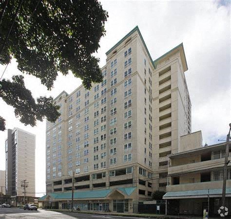 a tall building on the side of a street