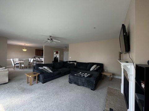 a living room with a couch and a tv