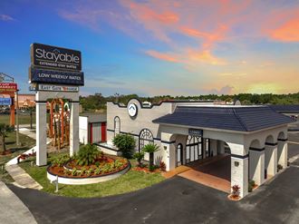 a rendering of storydale restaurant with a sign on the side of the building