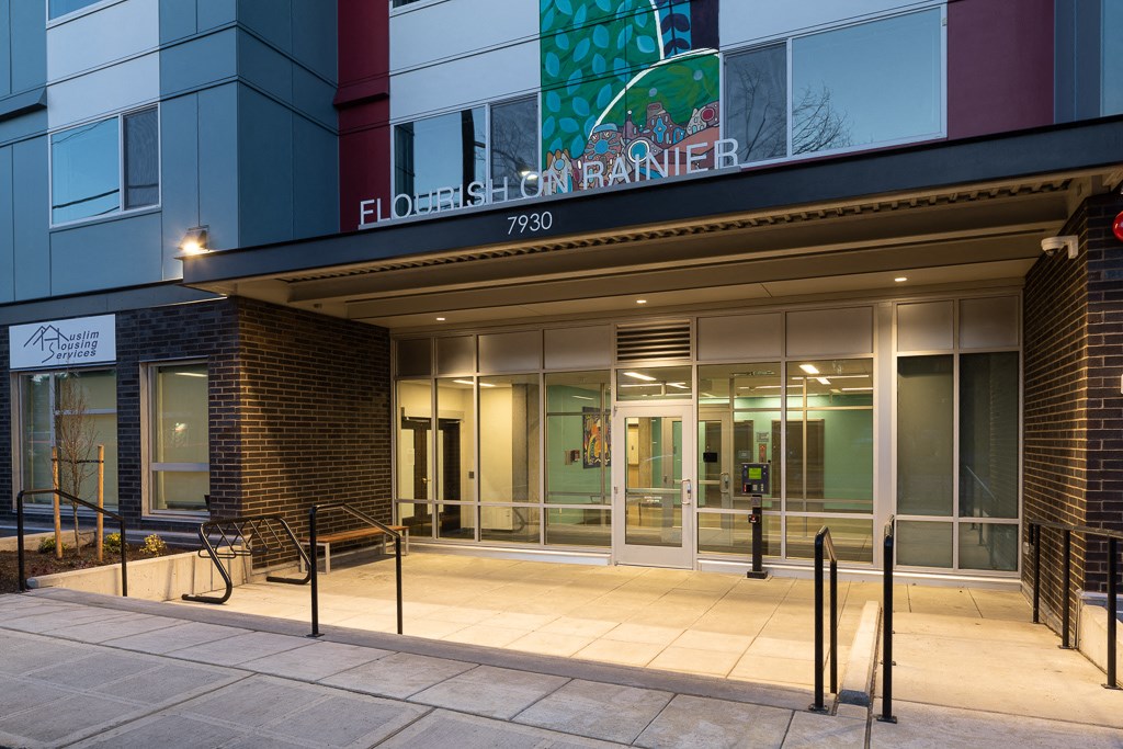 the entrance of a building with glass doors
