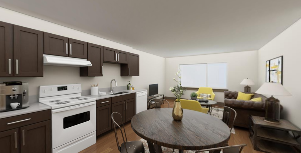 a kitchen and living room of an apartment