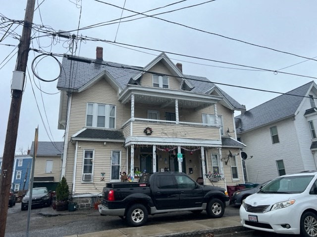 a house with a truck parked in front of it