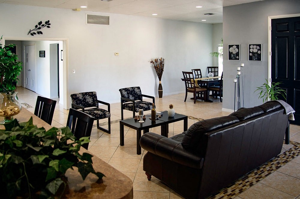 a living room with a couch and a table