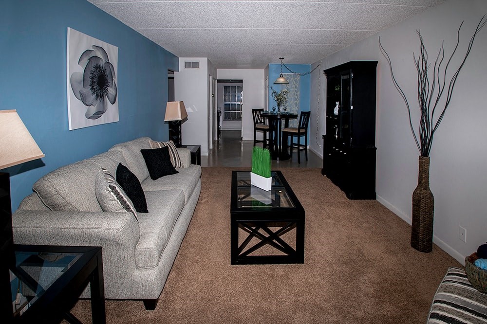 a living room with a couch and a coffee table