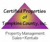 a purple triangle with the words certified properties