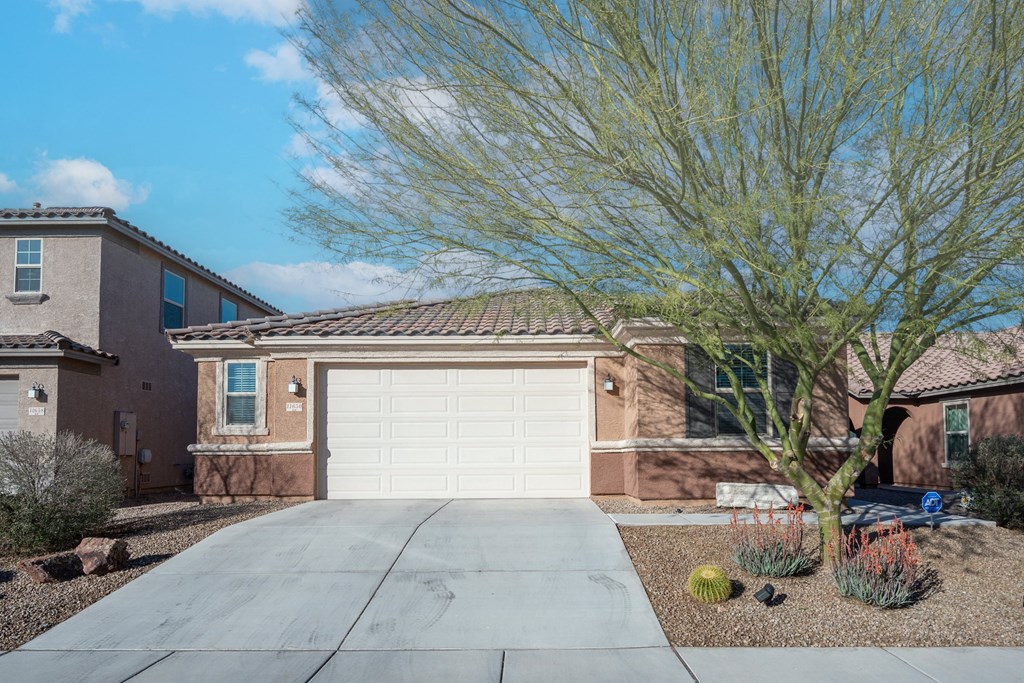 a garage door in front of a house