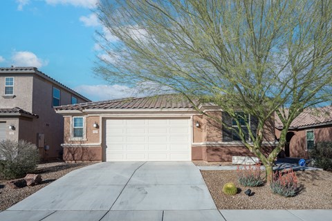 a garage door in front of a house