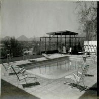 an old black and white photo of a swimming pool