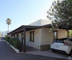 a house with a car parked in front of it
