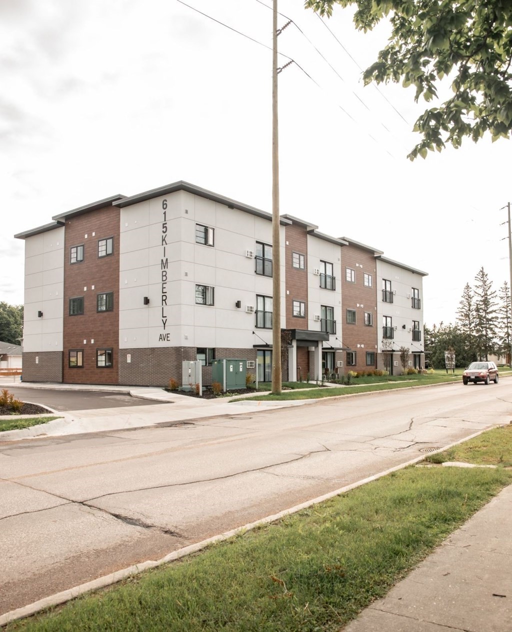 A street view of a building with the name "615K MODERN" on it.