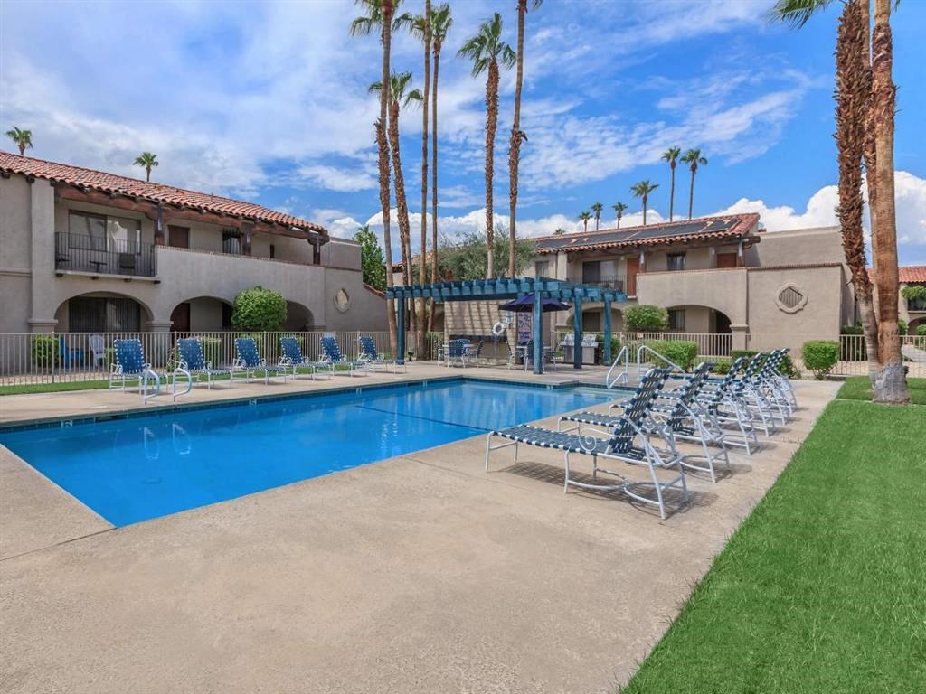 the swimming pool at the villa apartments in palm springs