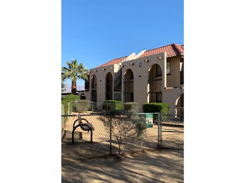 a building with a playground in front of it
