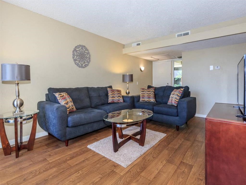 a living room with a couch and a coffee table