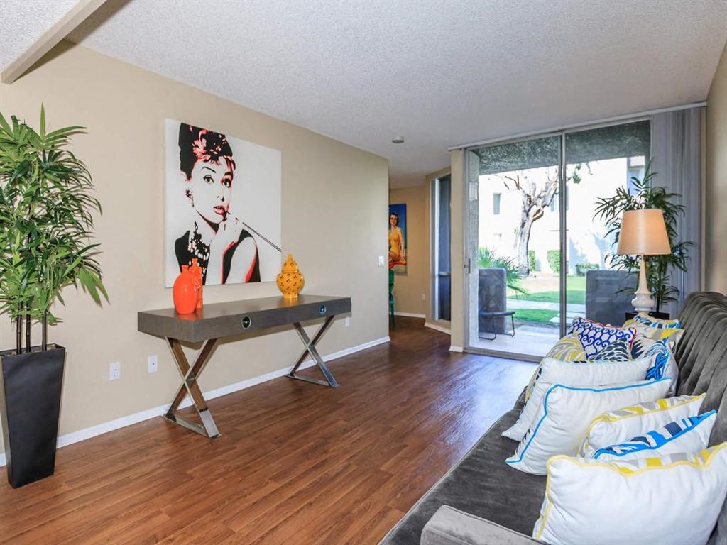 a living room with a couch and a table