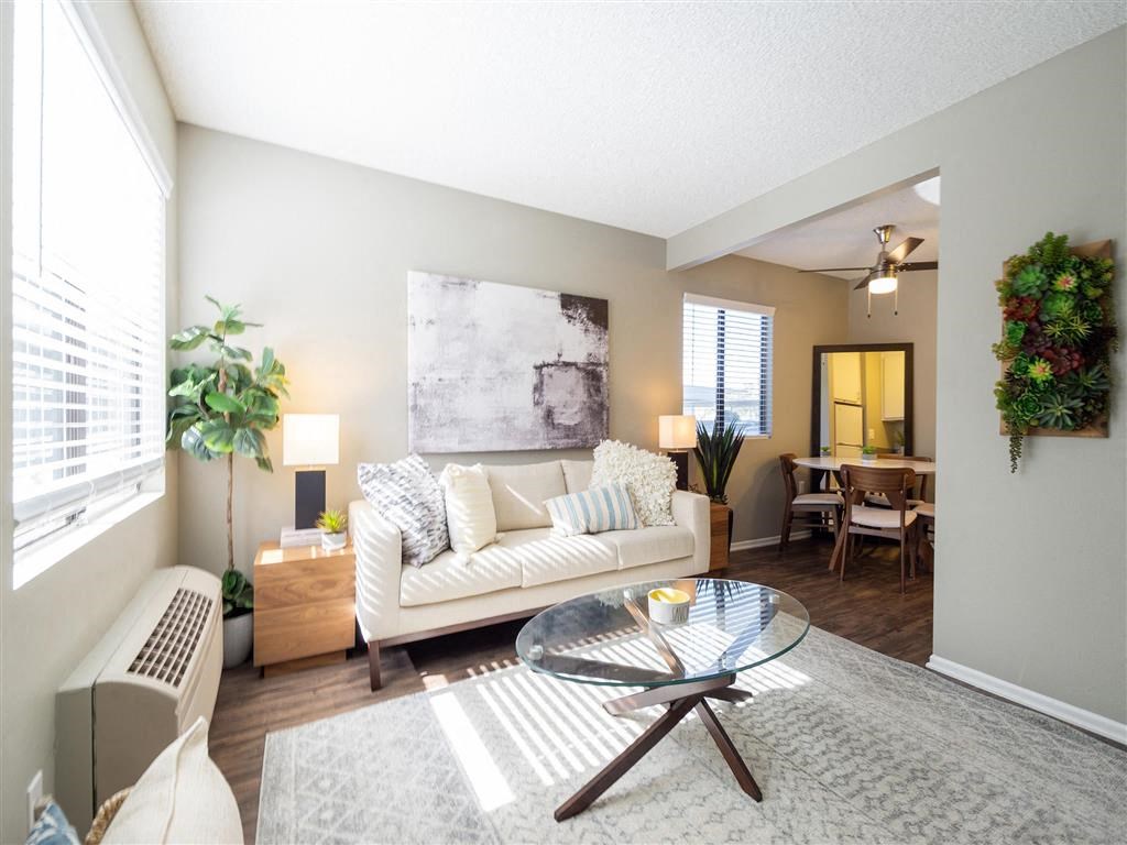 a living room with a couch and a table