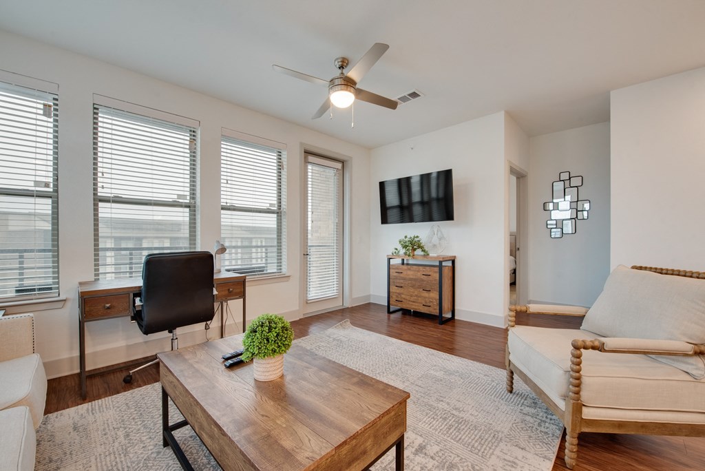 an open living room with a couch and a coffee table