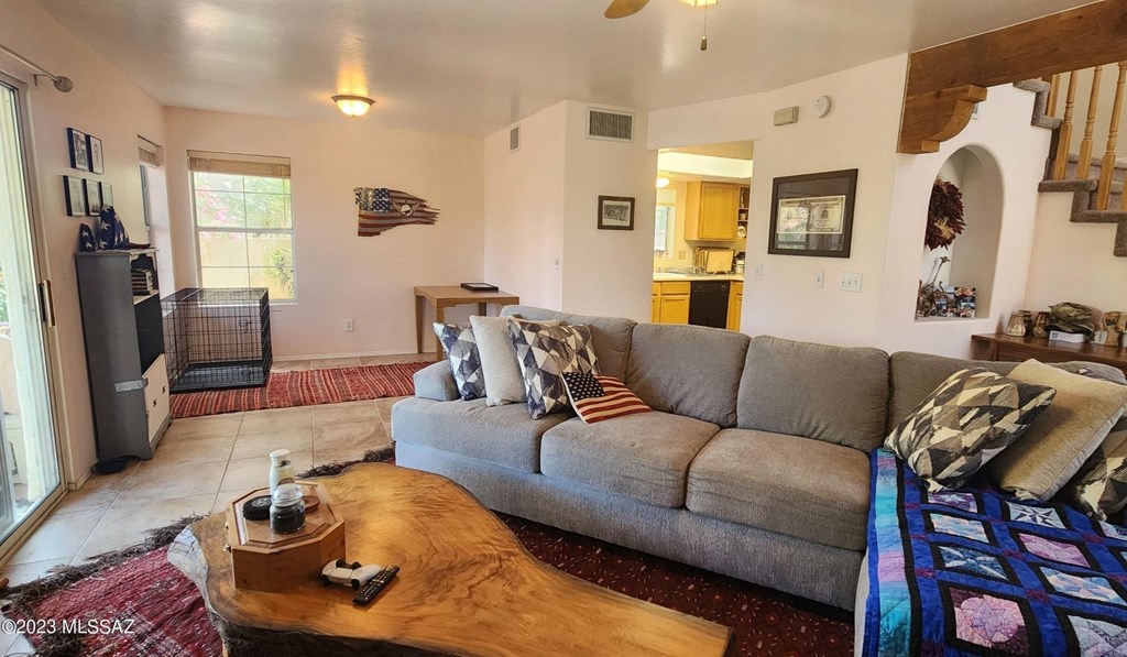 a living room with a couch and a table