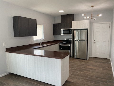 a kitchen with a counter top and a refrigerator