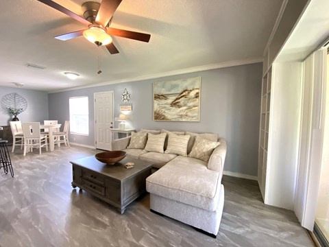a living room with a couch and a coffee table