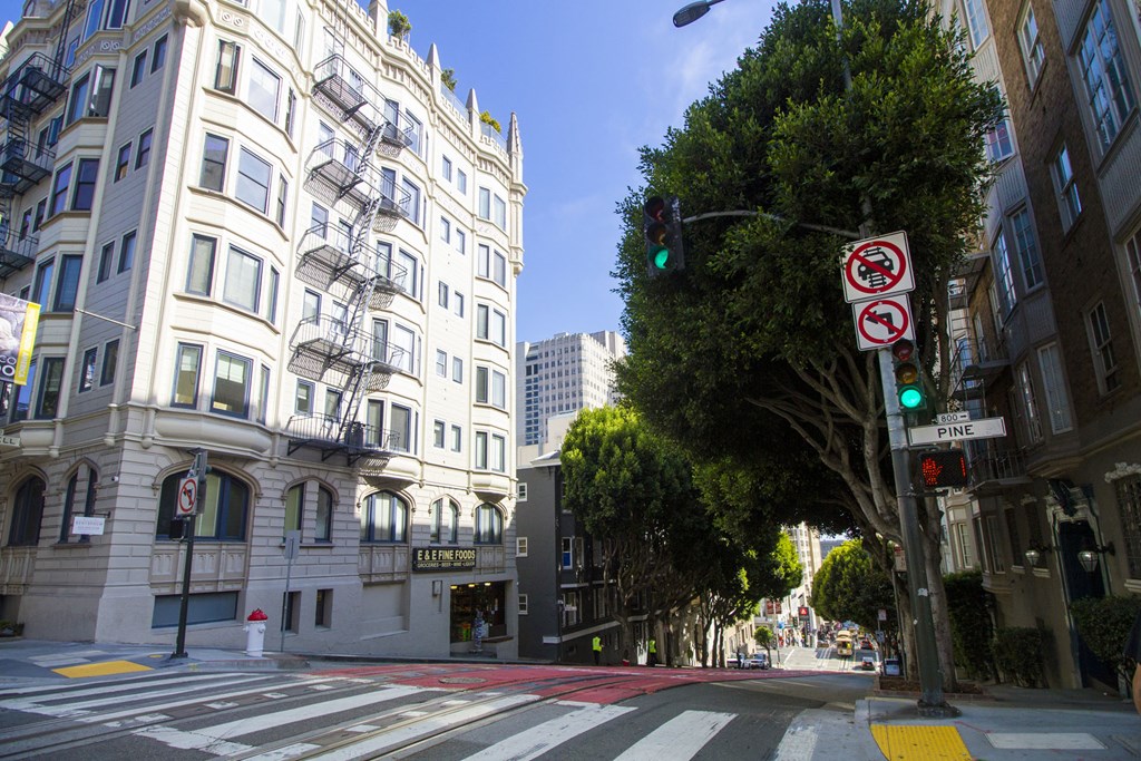 A street view with a no parking sign.