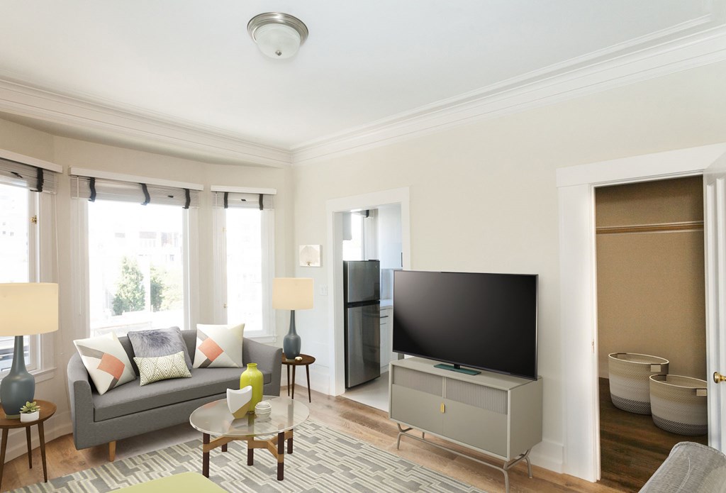 a living room with a couch and a television