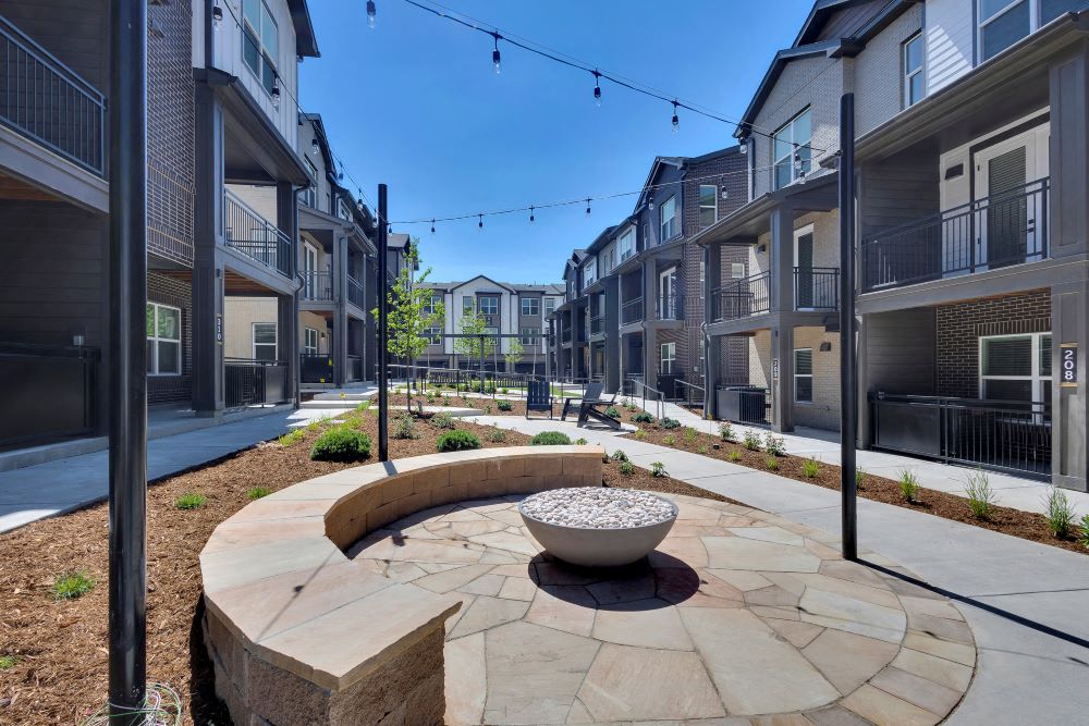 Outdoor fire pit and hanging lights at the courtyard