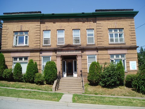 A brown building with the word "BELVEDERE" on the front.