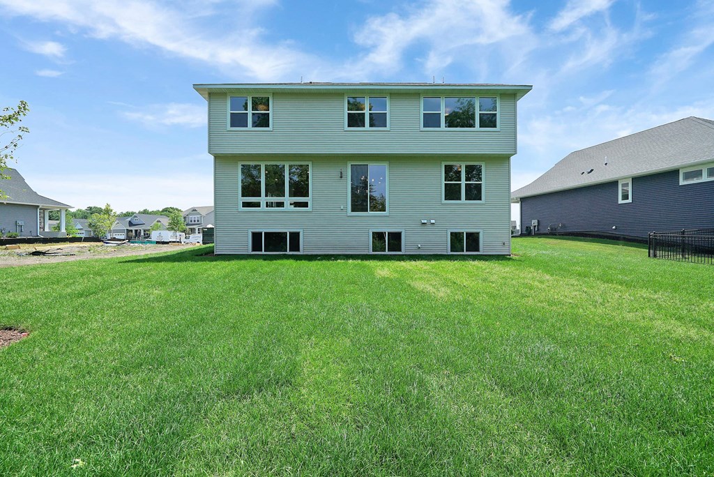a large lawn in front of a house