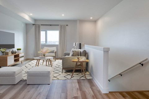 a living room with a couch and a table