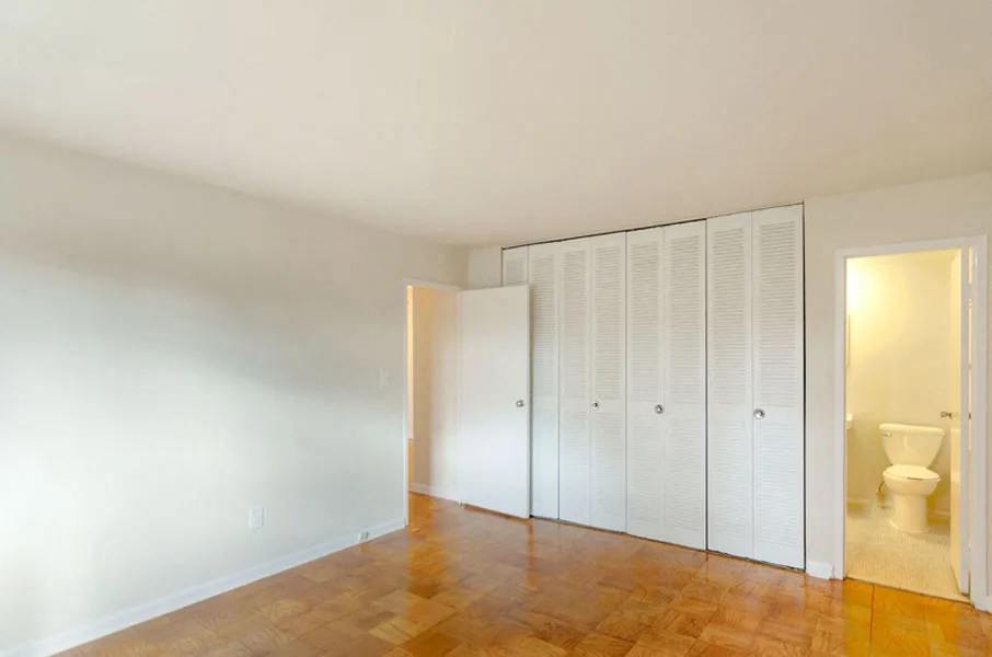 1B Master Bedroom and Closets