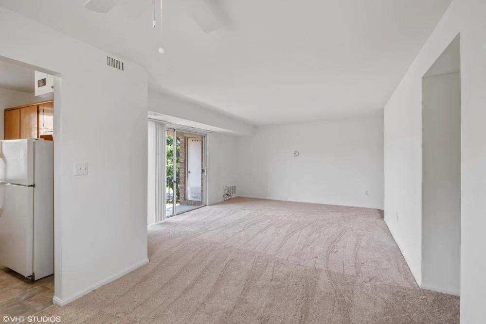 Plush carpeting in the spacious living room and dining area