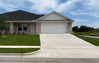 a house with a driveway in front of it