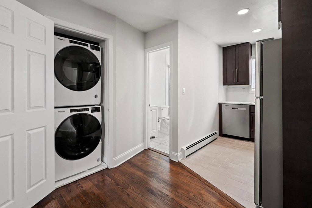 a small laundry room with a washer and dryer in it