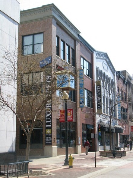 a building on the corner of a city street