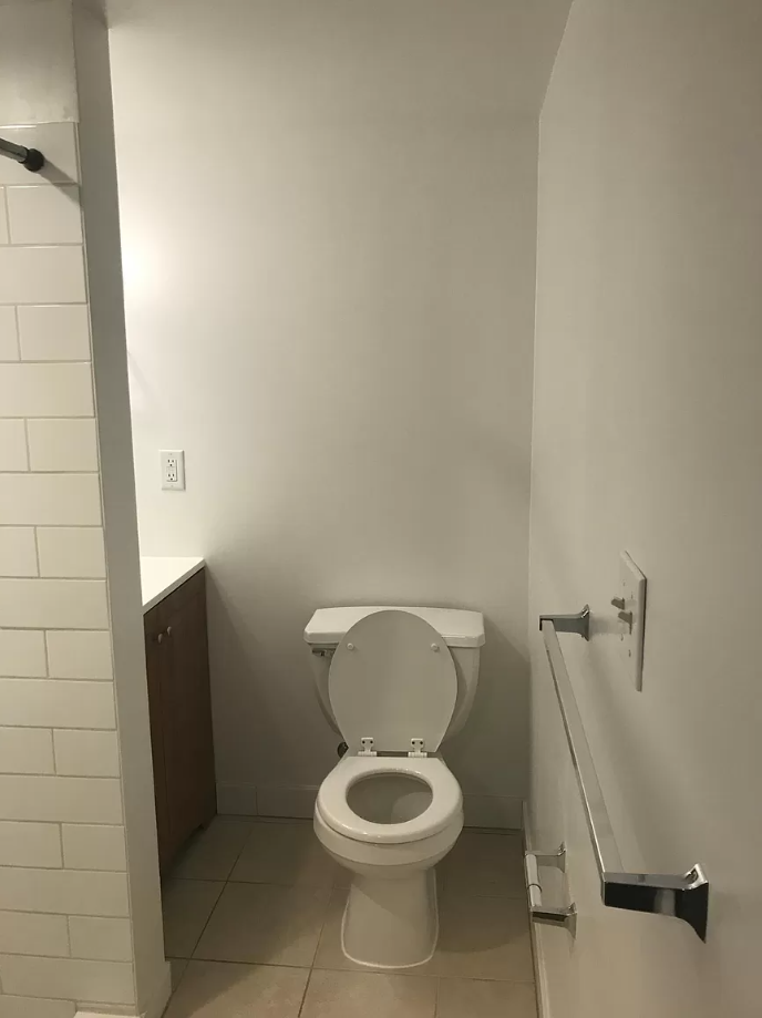a small bathroom with a toilet and a sink